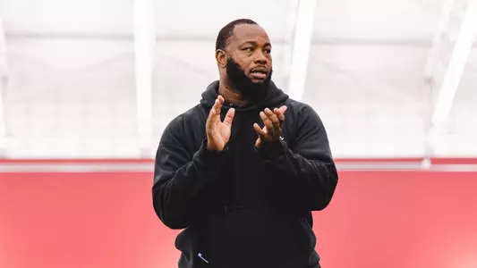 Running backs coach John Johnson clapping during 2026 spring practice.