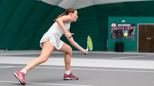 Millie Day practices at Iowa State Tennis Facility