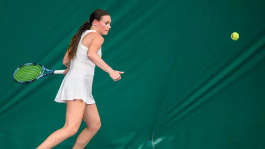 Millie Day practices at Iowa State Tennis Facility