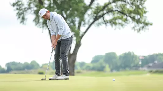 Dianchao Wu putts at the 2026 Big 12 Championship.