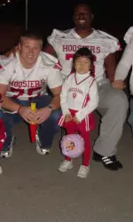 Members of the IU football and women's basketball teams handed out Halloween candy at the College Mall on Monday.