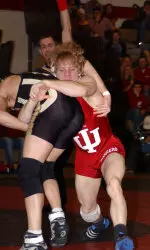 Senior Joe Dubuque claims first title of 2005-06 season.