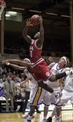 Roderick Wilmont jumps for a layup over Western Illinois players.