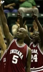 Indiana players Marco Killingsworth (5) and Robert Vaden (24) celebrate their 71-54 win over Charlotte in their basketball game at Halton Arena in Charlotte, N.C., Monday Dec. 19, 2005. Killingsworth had 17 points and Vaden had 14 points to lead the Hoosiers.(AP Photo/Chuck Burton)