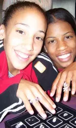 Cyndi Valentin and Janese Banks of Wisconsin try on diamond rings at the Gassan Diamond Factory that the All-Stars visited in Amsterdam.