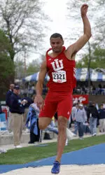 Nine-time All-American Aarik Wilson made it past the qualifying round of the triple jump.