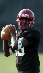 Freshman quarterback Kellen Lewis connected on two exceptional 20-yard passes during Tuesdays practice.