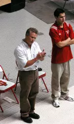Huber will coach at the World University Games, which will be televised.