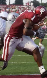 Indiana's Jahkeen Gilmore (1) hauls in a pass in the end zone as Nicholls State's Joe Ogletree (29) dives behind him trying to break up the play during the second quarter in Bloomington, Ind.