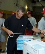 Head coach Tracy Smith and members of the Indiana baseball team loaded boxes of supplies to be taken to victims of Hurricane Katrina.
