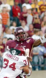 Central Michigan quarterback Kent Smith attempts to complete a pass before being tackled by linebacker John Pannozzo Friday night.