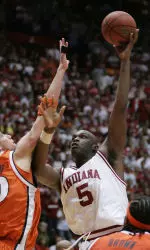 Indiana's Marco Killingsworth, right, puts up a shot over Illinois' James Augustine during the second half of a college basketball game in Bloomington, Ind., Tuesday, Jan. 17, 2006. Indiana defeated Illinois 62-60. Killingsworth finished with a team high 23 points. (AP Photo/Darron Cummings)