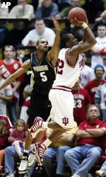 Indiana's Marshall Strickland, right, shoots while being defended by Purdue's Bryant Dillon during the first half. (AP Photo/Darron Cummings)