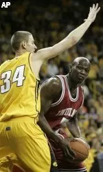 Indiana's Marco Killingsworth, right, looks to drive around Iowa's Erek Hansen during the first half of this NCAA college basketball game, Tuesday, Jan. 24, 2006, in Iowa City, Iowa. (AP Photo/Charlie Neibergall)