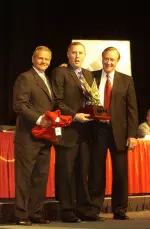 NSCAA President Schellas Hyndman (left) and Jerry Yeagley (right) present Don Rawson (middle) with the inaugural Jerry Yealgey Award at the NSCAA National Convention on Jan. 21 (NSCAA photo by Perry McIntyre Jr.).