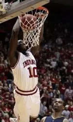 Roderick Wilmont goes in for a dunk against Michigan's Chris Hunter. (AP Photo/Darron Cummings)