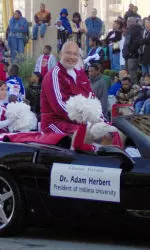 Indiana University President Dr. Adam W. Herbert and the IU cheerleaders participated in the Circle City Classic earlier this month.