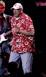 Head Coach Terry Hoeppner onstage with the Beach Boys.