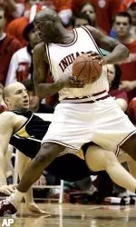 Marco Killingsworth drives to the basket against Iowa's Greg Brunner during the first half.
