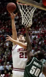 Indiana's Ben Allen of Australia, left, puts up a shot against Michigan State's Delco Rowley. (AP Photo/Tom Strattman)