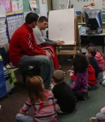 Josh Lewis (left) and Doug Fleenor visited with students at Edgewood Primary School on Feb. 27.