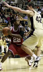 Purdue's Matt Kiefer attempts to trap Marshall Strickland during the second half.