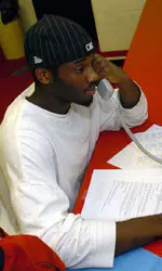 Roderick Wilmont makes thank you calls during the Varsity Club's annual Thank-a-Thon.