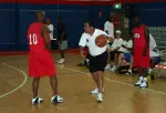 IU head coach Kelvin Sampson goes through a drill during morning workouts with his team, Camp Arifjan I.