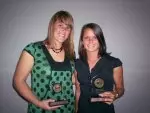 Haley Exner (left) and Meredith Brown with their First Team All-Big Ten Awards.