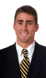 Bart Ginocchio's performance in the 500-yard freestyle earned him a red cap as the swimmer of the day.