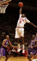 Guard Jordan Crawford drives the open lane for a dunk during the second half.