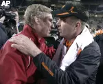 Indiana Head Coach Bill Lynch (left) and Oklahoma State Head Coach Mike Gundy