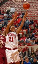 Whitney Thomas had 20 points and a career-high 14 rebounds in a losing effort against Dayton.