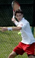 Arnaud Roussel won in singles and doubles on Senior Day.