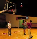 Freshman Jamie Braun (left) and alumnae Julie Kronenberger (middle) and Sue Watts (right) shoot around in Assembly Hall on Saturday, April 28.