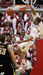 Indiana guard Eric Gordon, right, goes in for a dunk. (AP Photo/Darron Cummings)