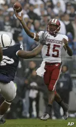 Kellen Lewis throws the ball as Penn State defender Sean Luchnick moves in during the first half of at Beaver Stadium in State College, Pa., Saturday, Nov. 15, 2008. (AP Photo/Carolyn aster)