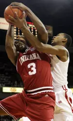D.J. White battles Ohio State's David Lighty for a rebound during the first half. (AP Photo/Terry Gilliam)