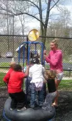 Kelsey Hall and local children at Head Start