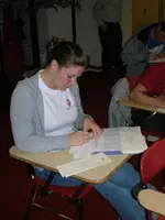 Brittney Feldman, a women's diving team member, finishes up her thank you notes at Thank-a-thon