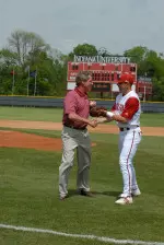 Head football coach Bill Lynch threw out the ceremonial first pitch at the IU-Louisville game on Tuesday.