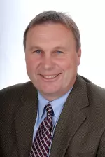 Mark Deal will step into the new position of associate director of football operations.