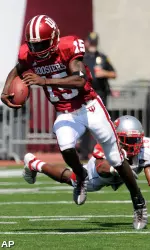 Kellen Lewis breaks off a 75-yard rush for a touchdown against Western Kentucky. (AP Photo/Tom Strickland)