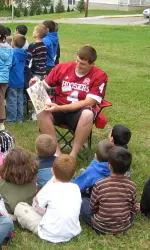 Coach Lynch, Ben Chappell (above) and Aaron Price visited with students from Fairview Elementary School.