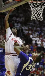 Maurice Creek puts up a shot against Kentucky forward Daniel Orton. (AP Photo/Darron Cummings)