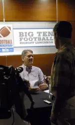 Fred Glass visits with the media in Chicago
