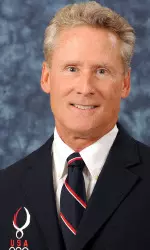 Dr. Jeff Huber was presented with the Coach Award of Excellence and the Mike Peppe Award by USA Diving.