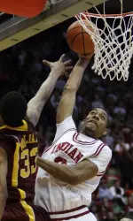 Christian Watford goes up for a dunk against Minnesota forward Rodney Williams.