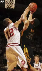Iowa forward Aaron Fuller shoots over Indiana guard Verdell Jones III (12) during the first half.