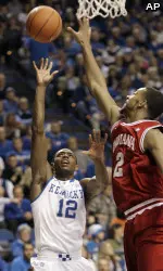 Christian Watford blocks a shot against Kentucky. Watford led the Hoosiers with 19 points and nine rebounds in Saturday's game.